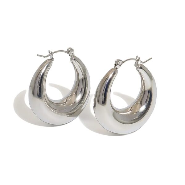 Hollow silver huggies