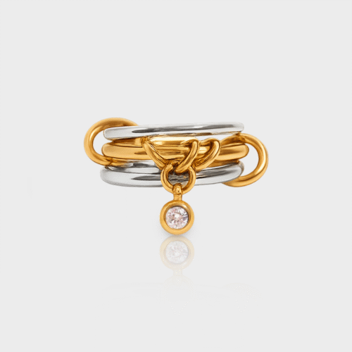 Gold and silver spinelli triple stone ring