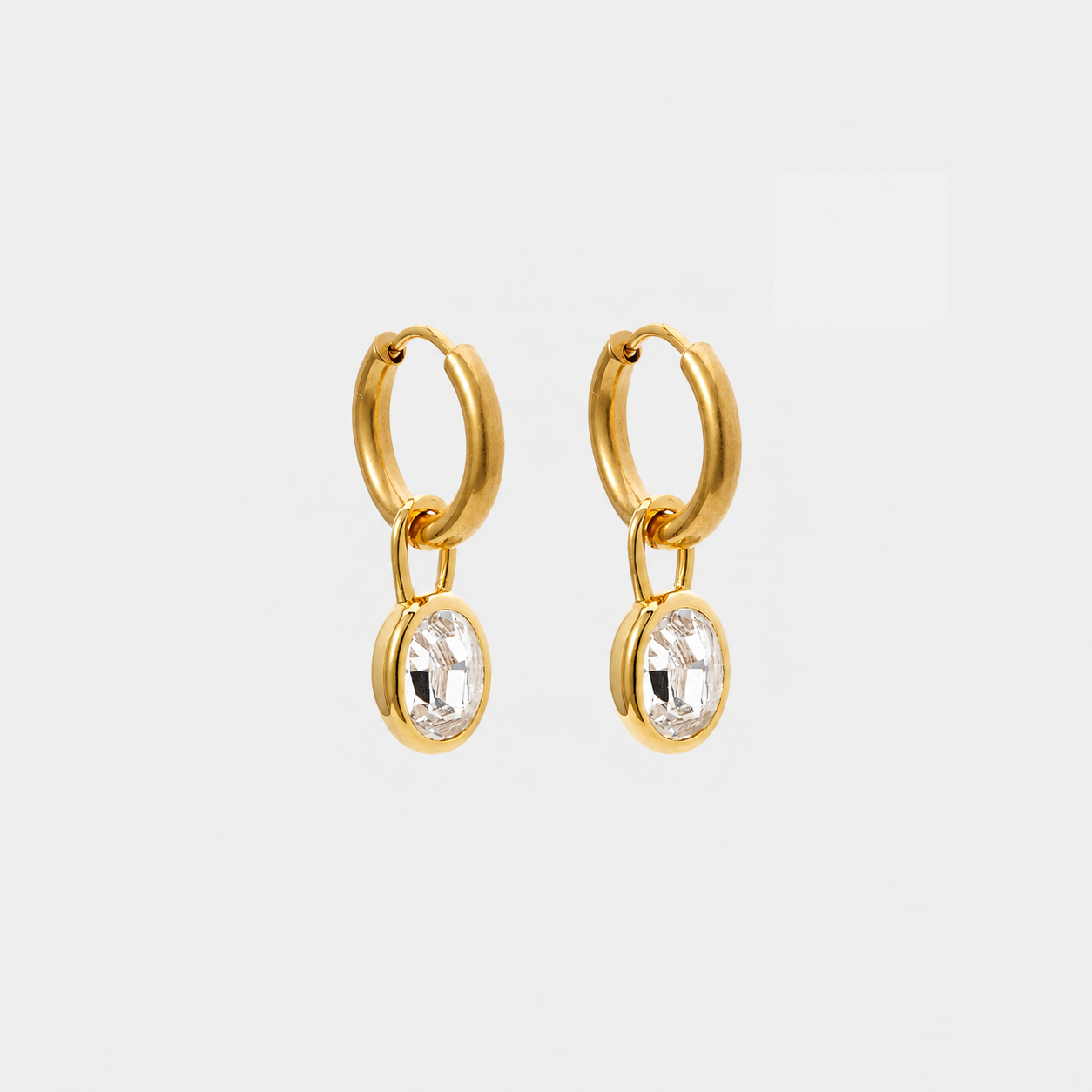 Oval zircon huggies